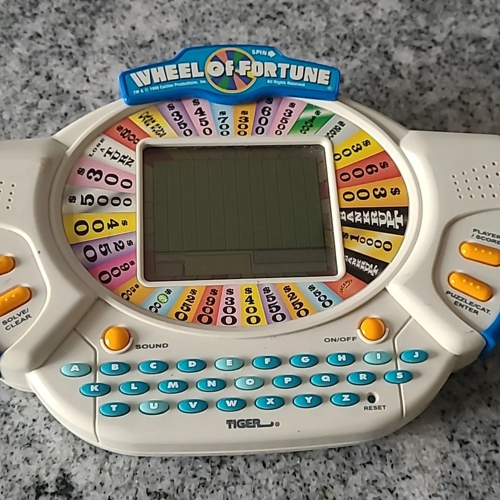 1998 Electronic Wheel of Fortune Hand Held Game